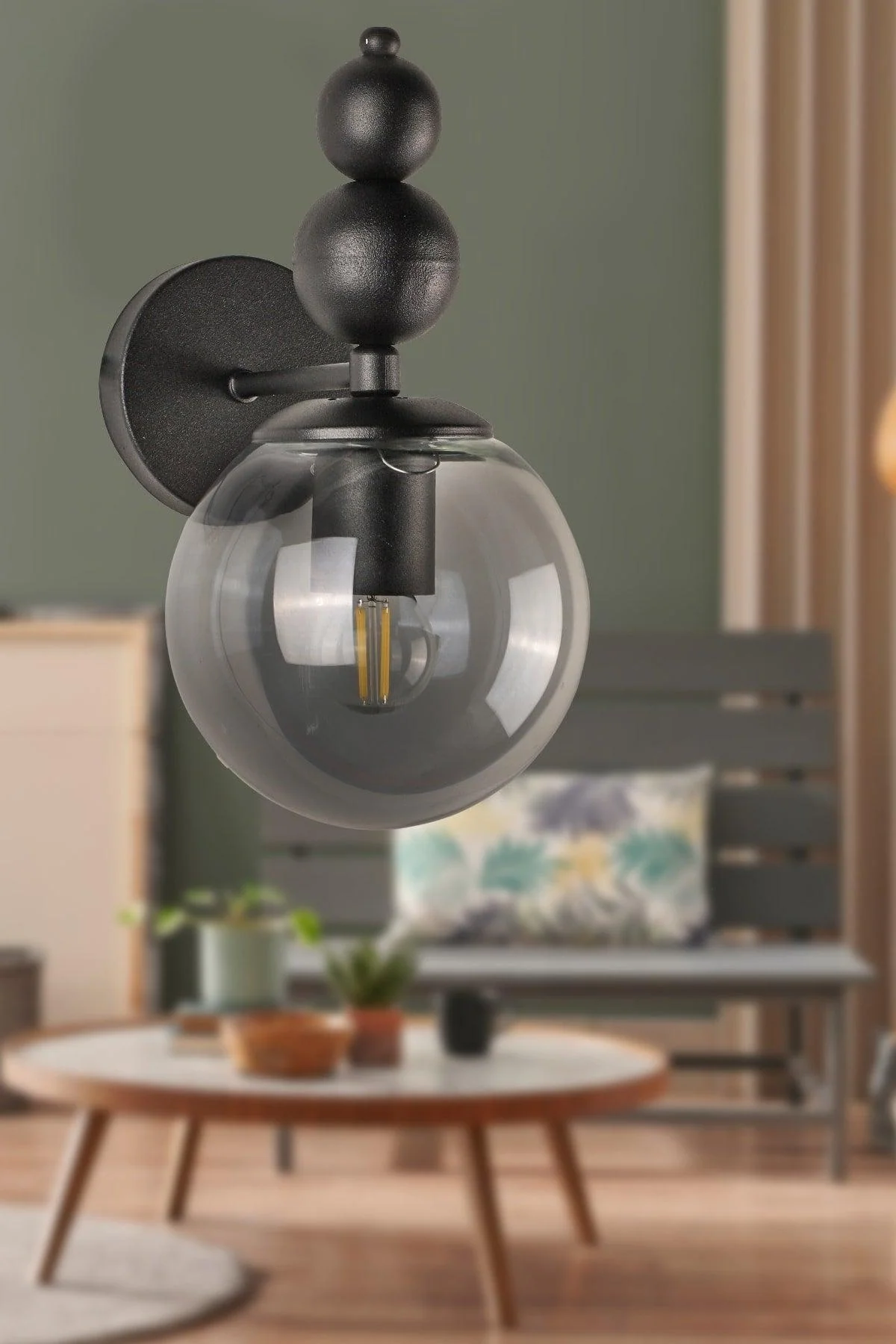 Black smoked glass wall sconce with metal frame 25cm diameter