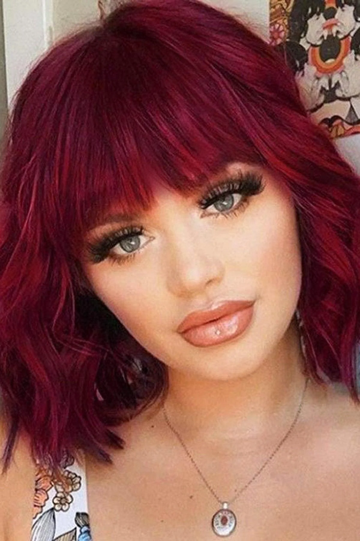 Red clip-in bangs for vibrant, voluminous style