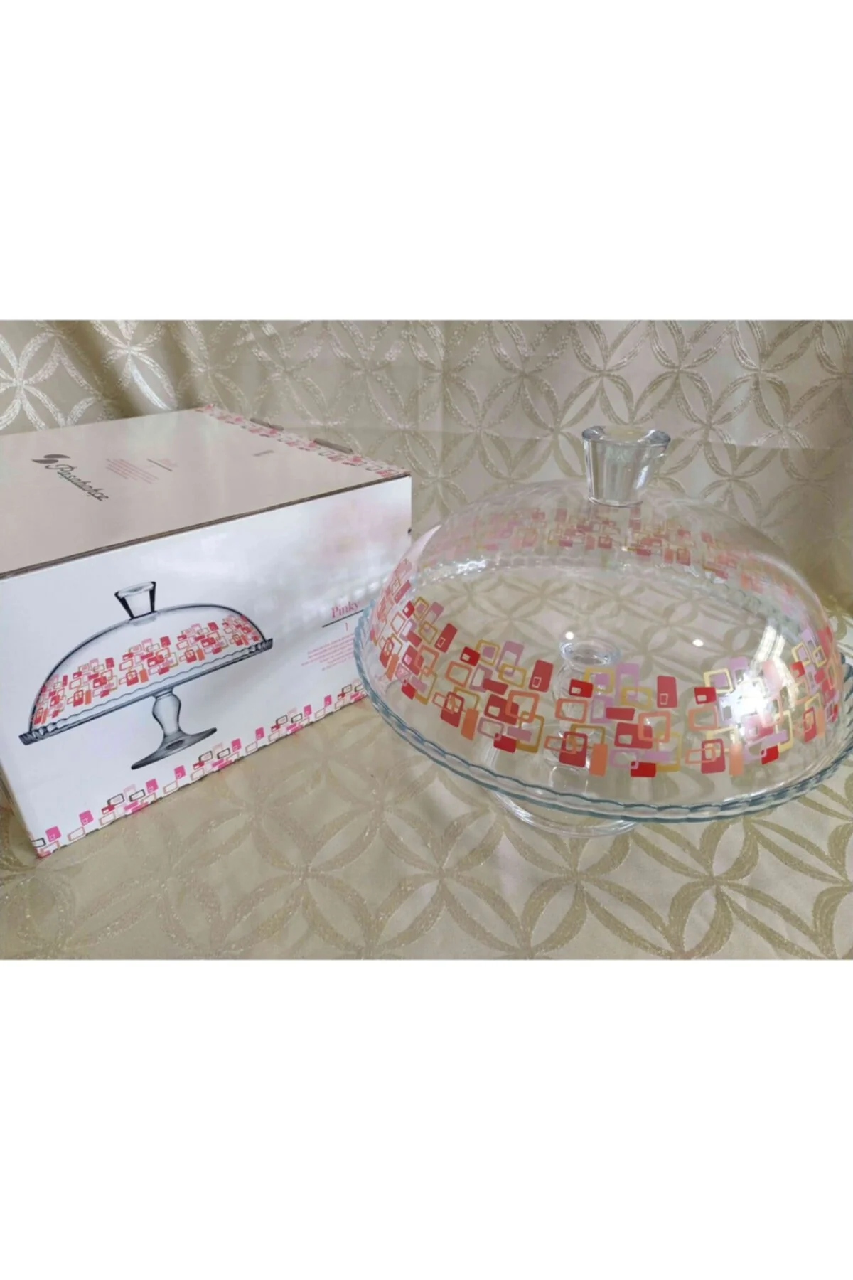32cm footed glass cake dome with geometric pink patterns and lid