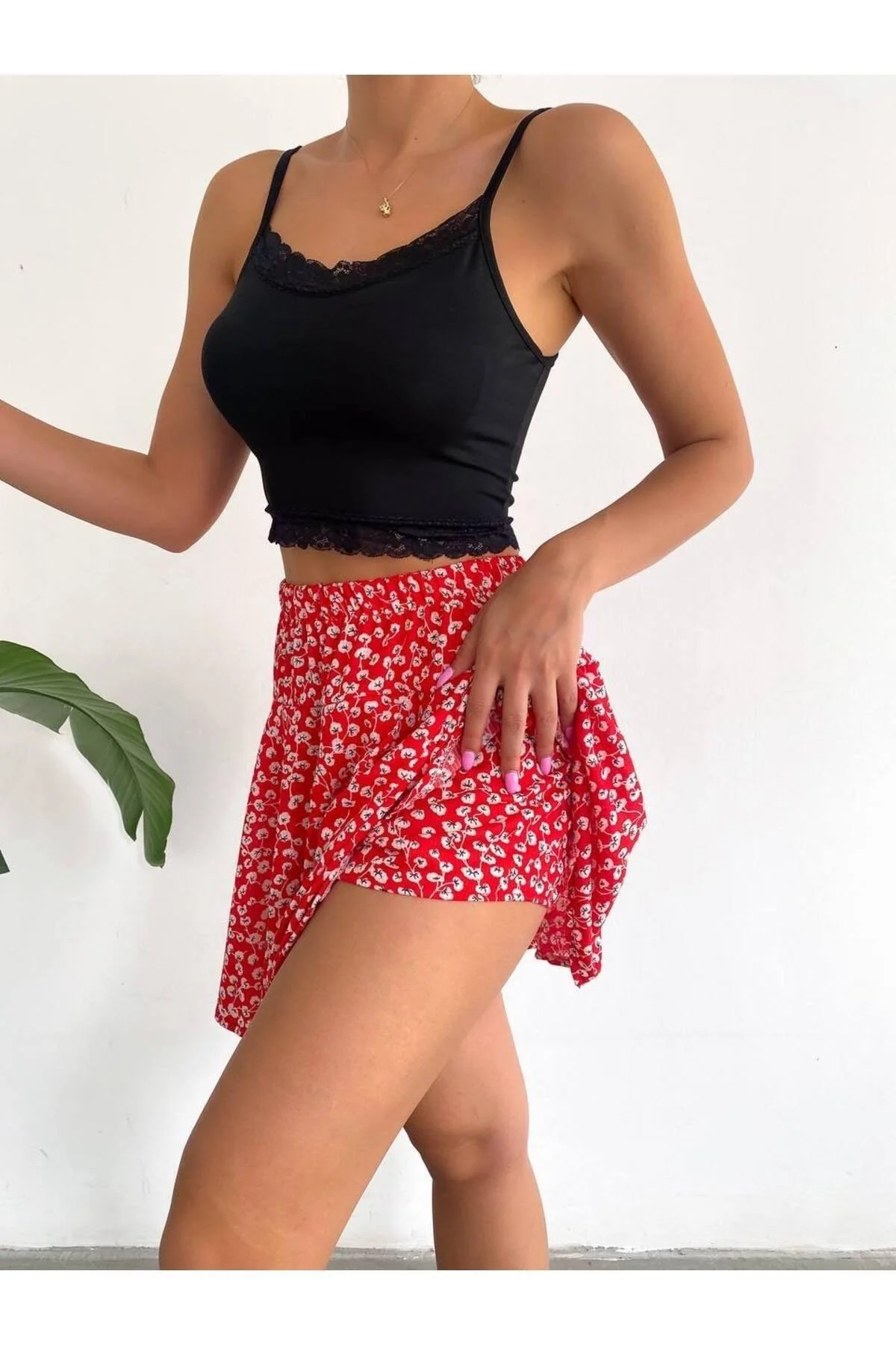 Red floral patterned short skirt with elastic waist