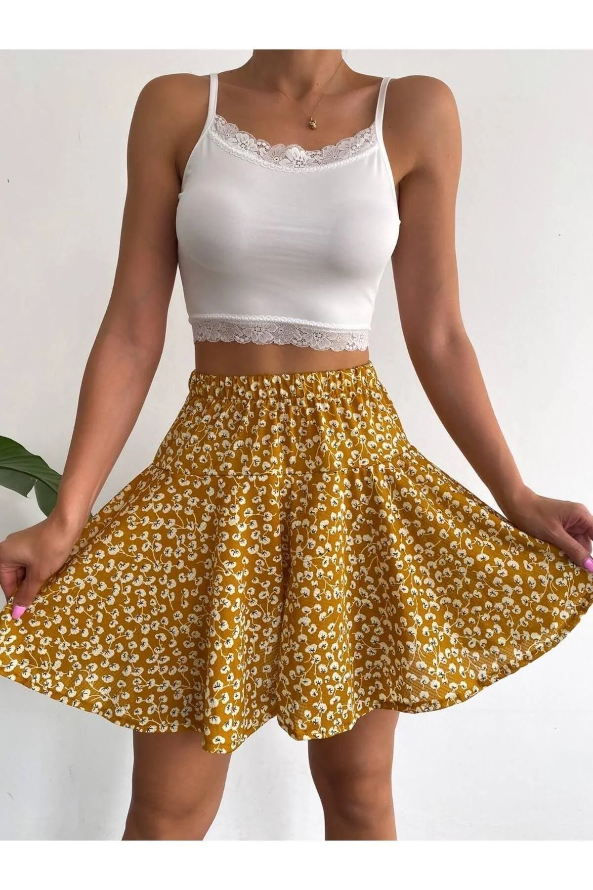 Yellow floral print short skirt with elastic waist