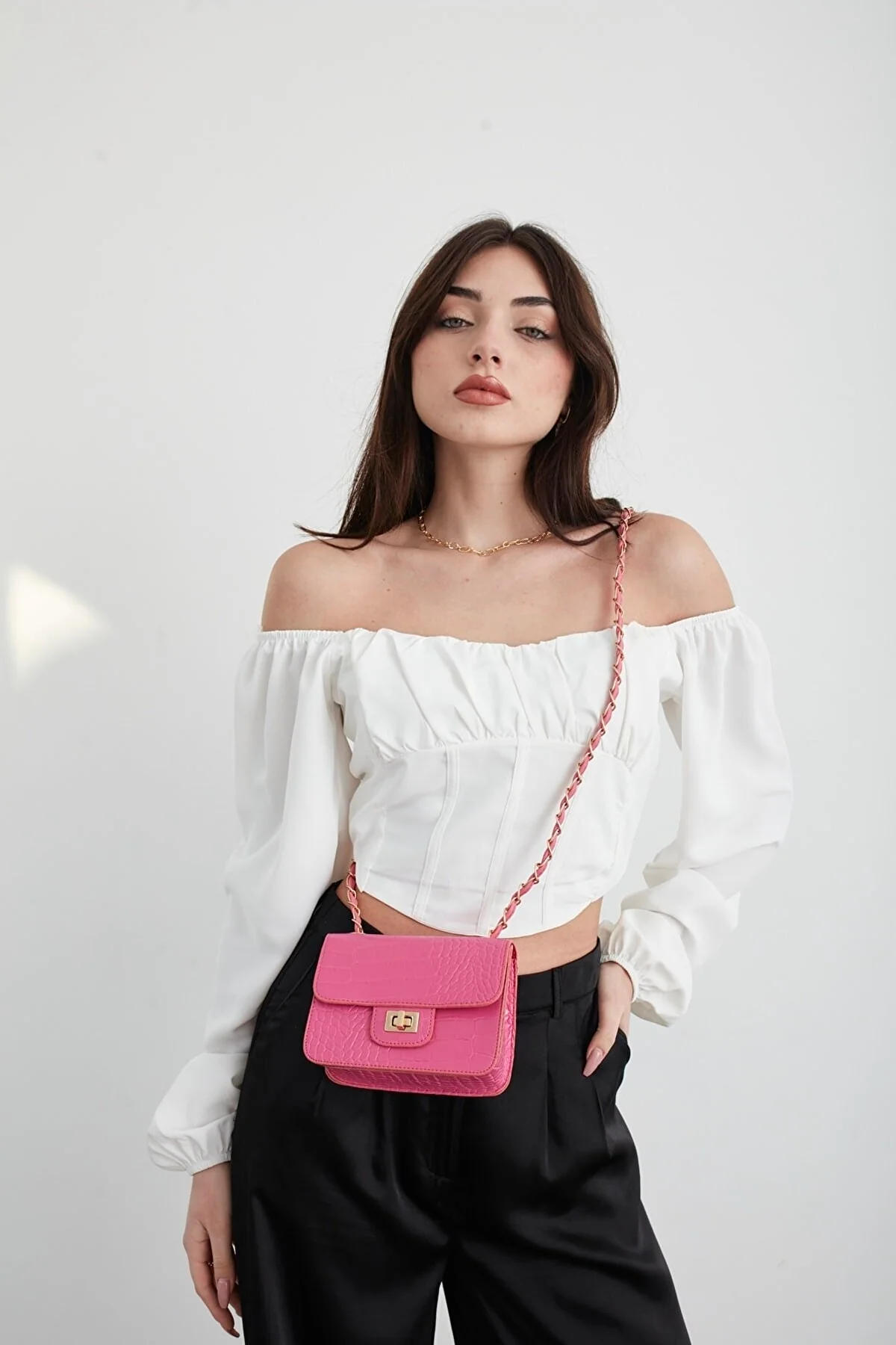Fuchsia crocodile-patterned mini shoulder bag with chain hanger and lock