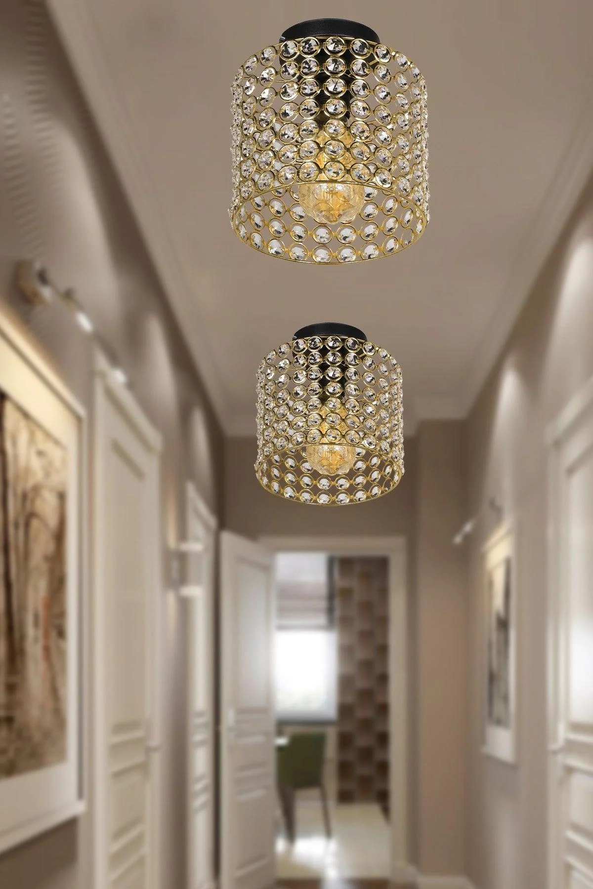 Single gold ceiling-mounted crystal chandelier