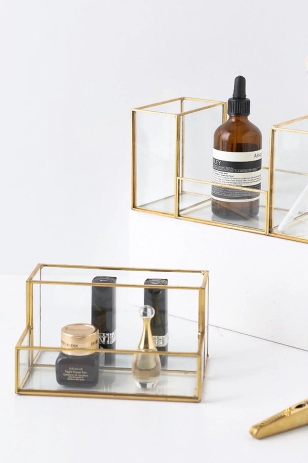 Gold-tone makeup brush organizer with mirror base