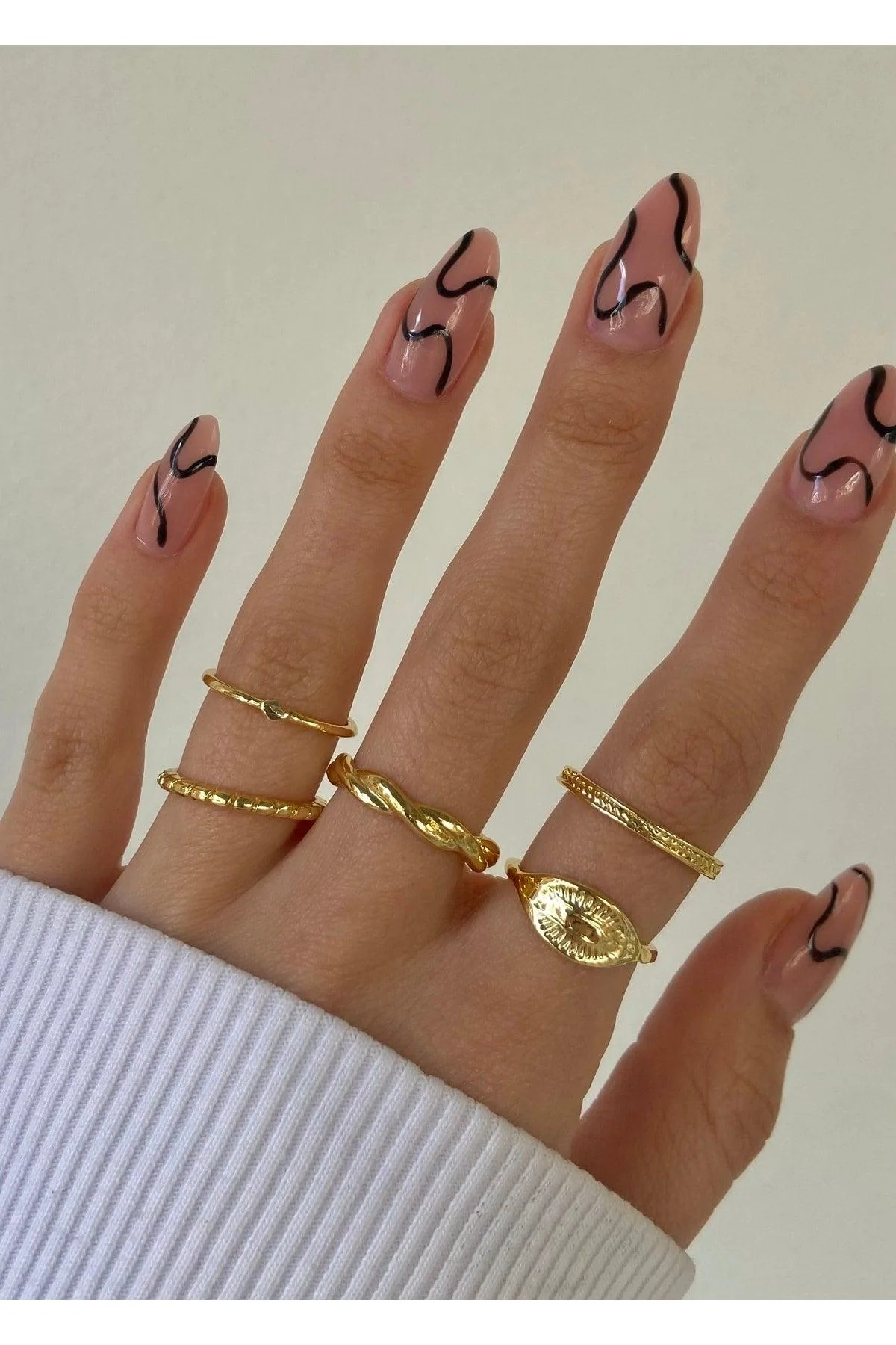 Set of 5 gold-colored adjustable rings