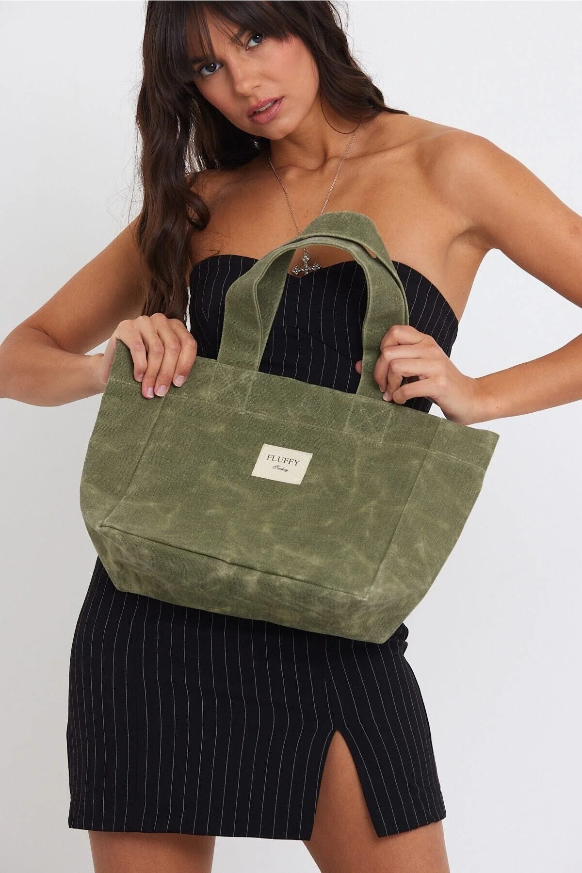 Waxed canvas shoulder bag in olive green