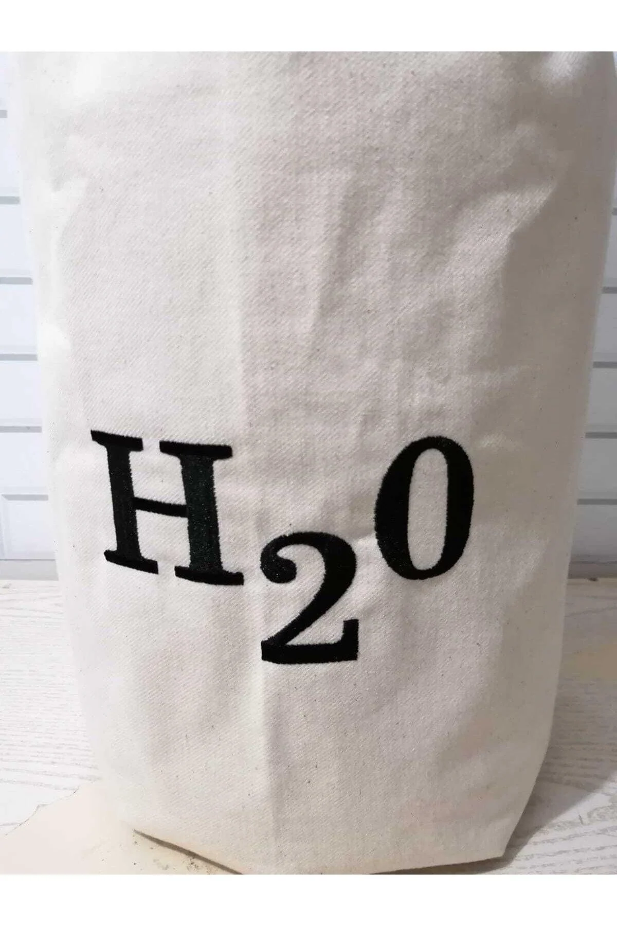 Machine-washable embroidered cover for 19-liter glass carboys