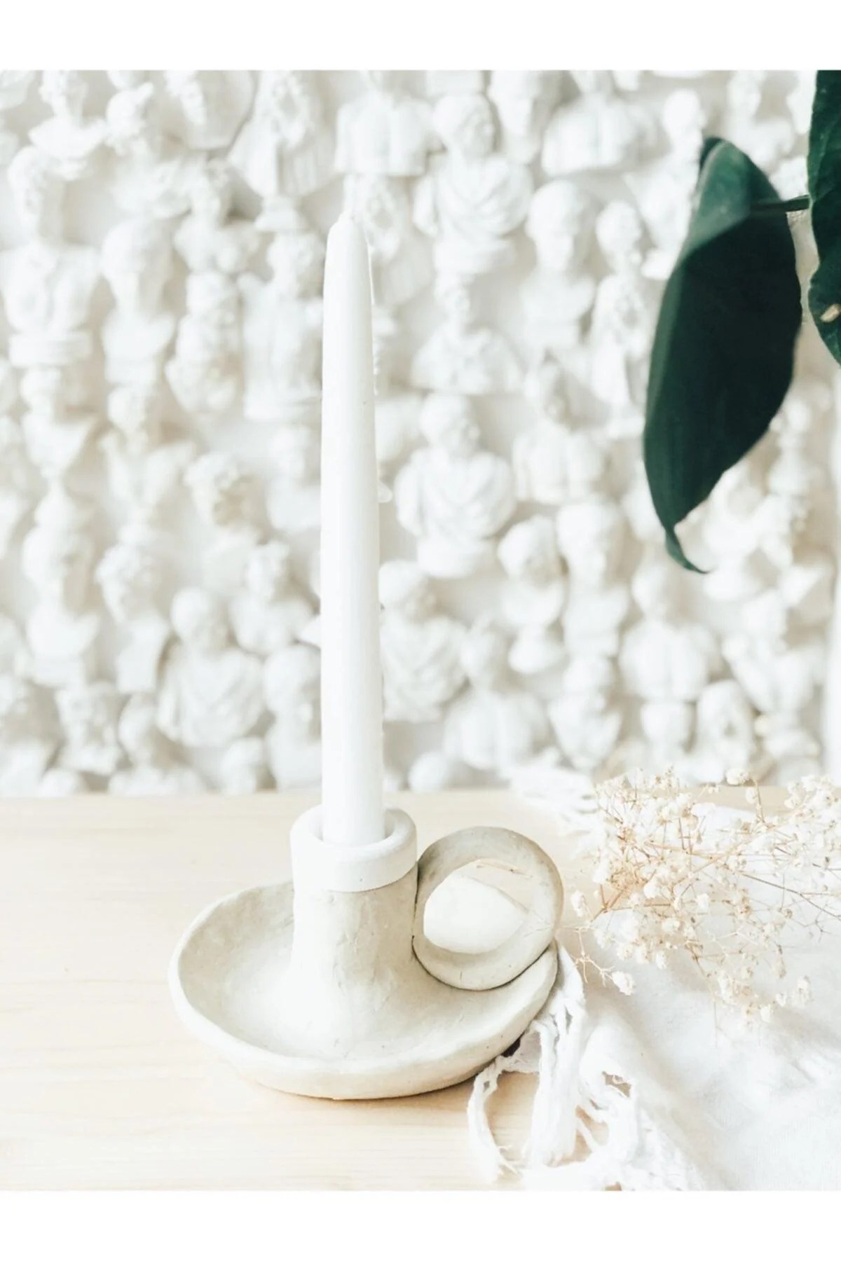 Handmade ceramic candlestick holder with textured finish