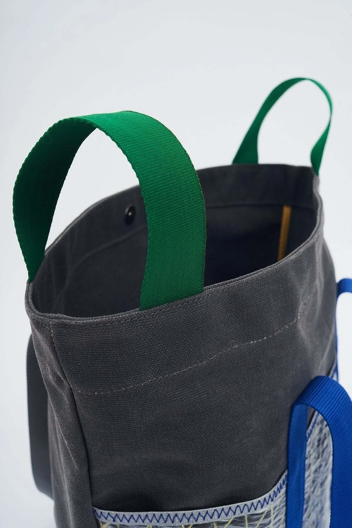 Upcycled waxed canvas and sail fabric duffel bag