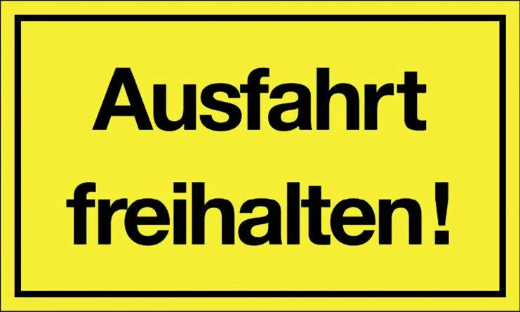 Keep exit clear safety sign