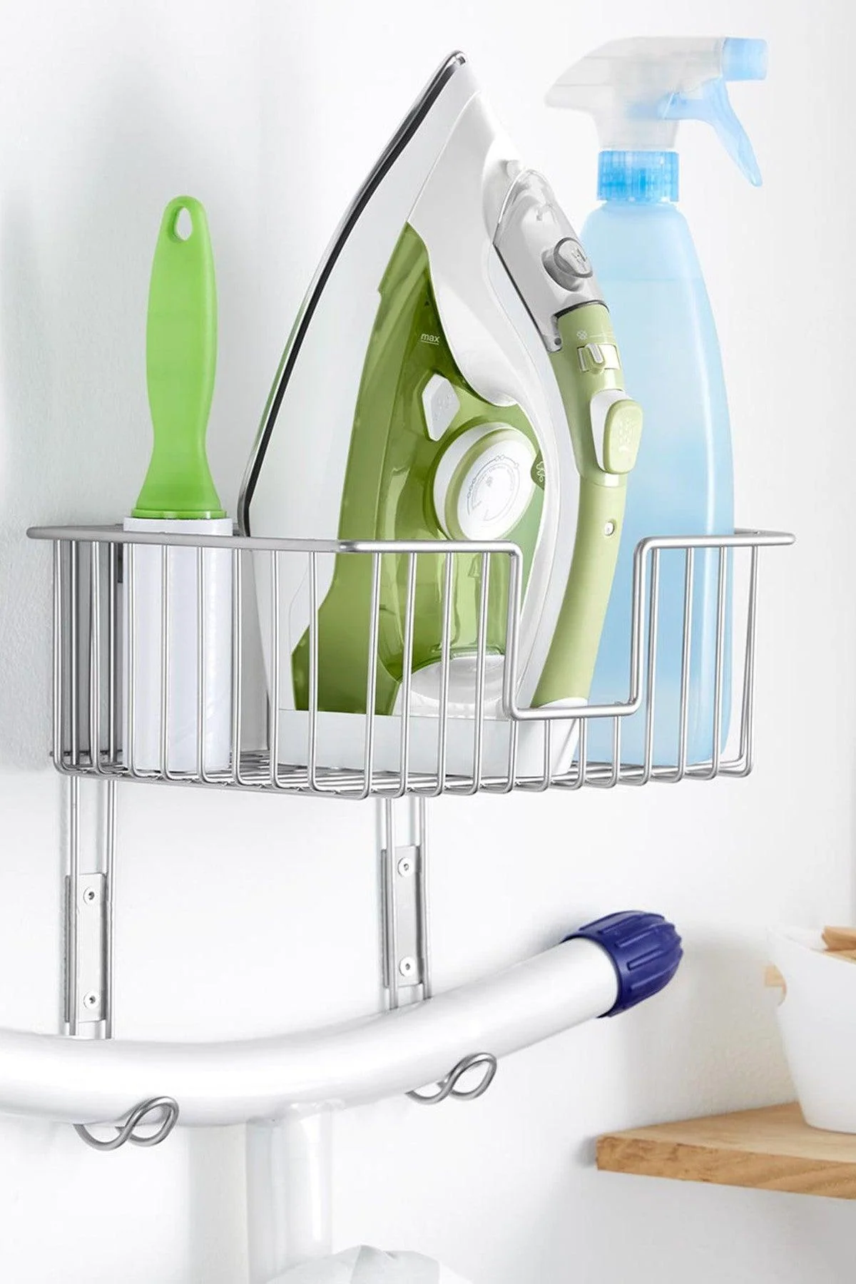 Iron holder with hanging clip for organized storage