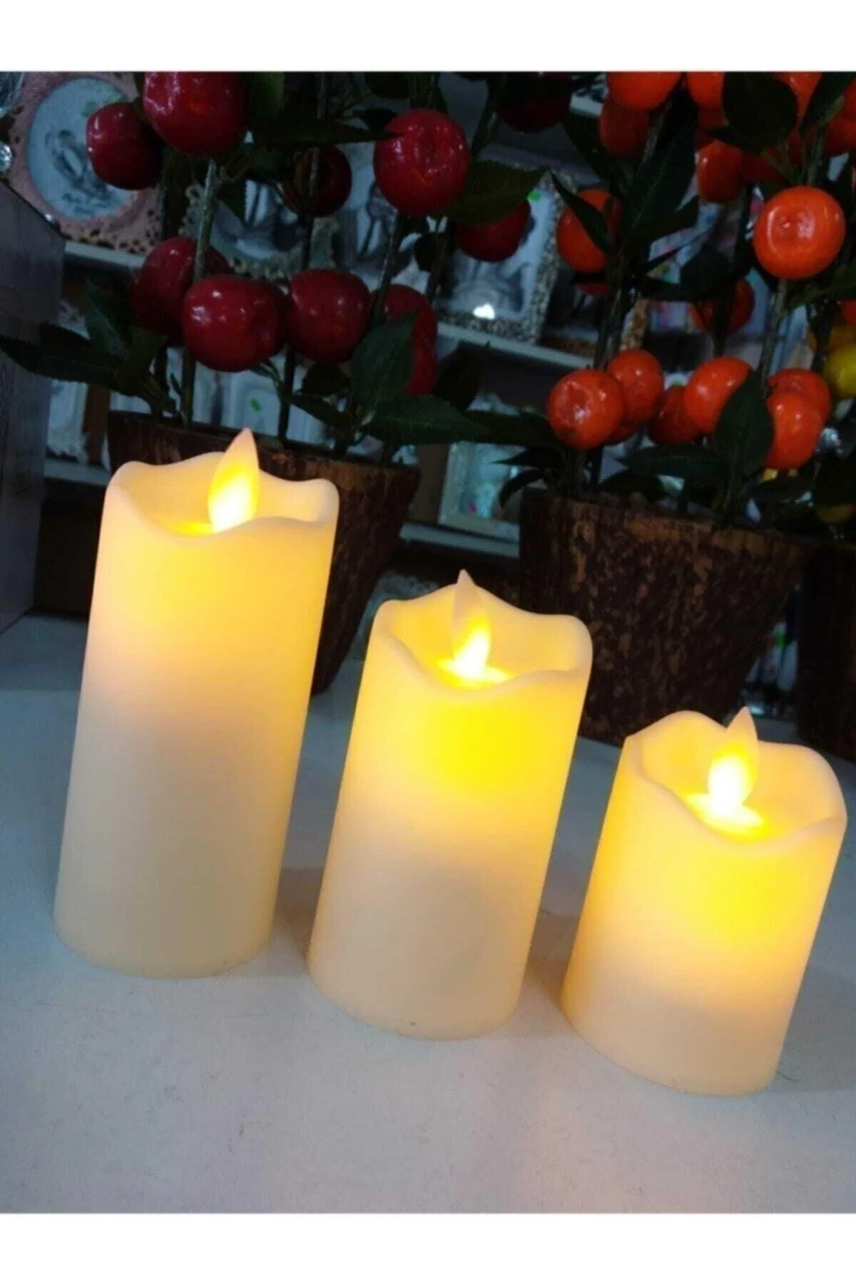 Battery-powered LED candles in 4.5, 7, and 9 cm sizes