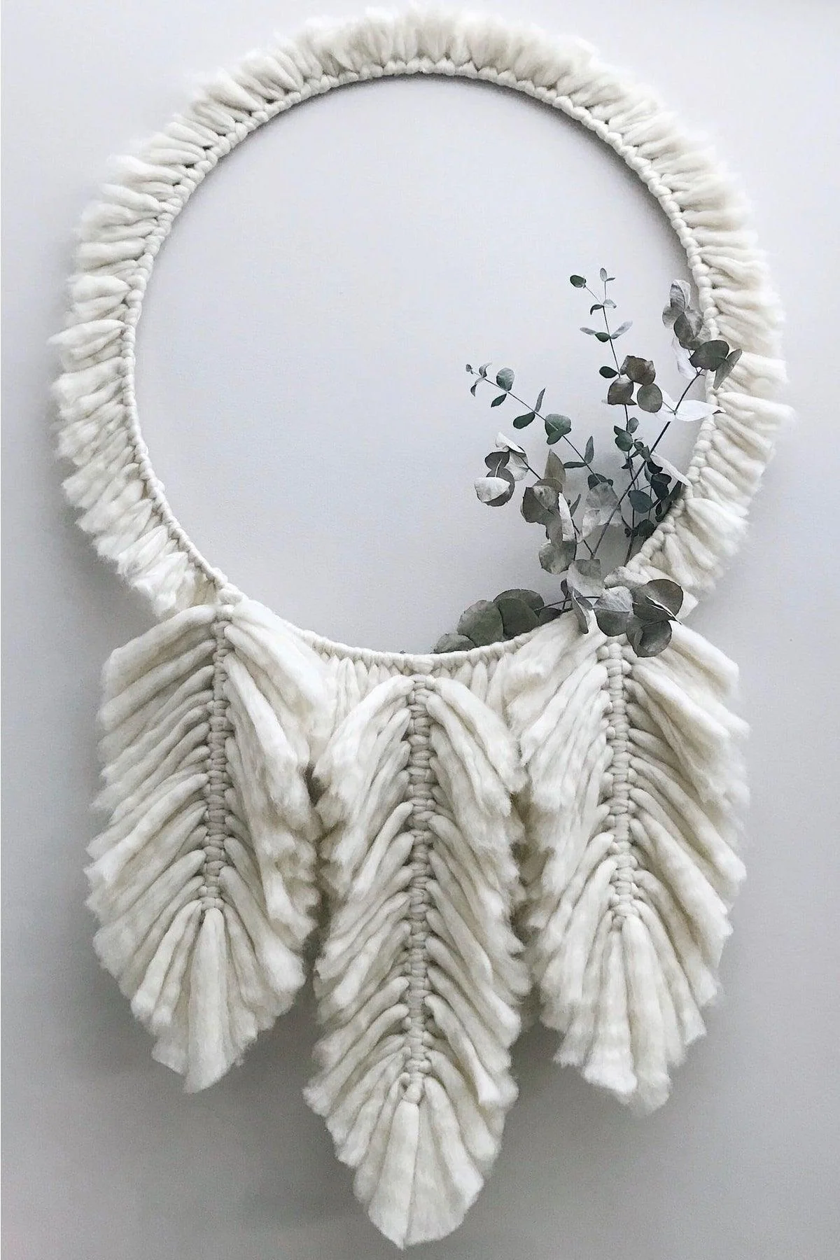 Handwoven macramé leaf decoration with three leaves