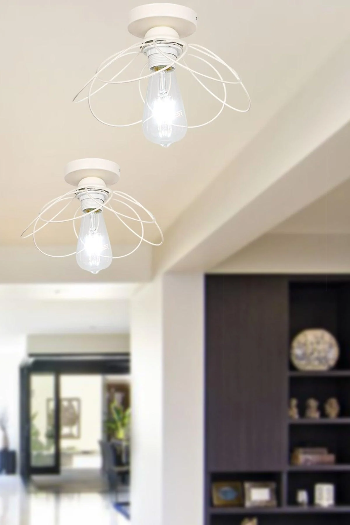 White ceiling-mounted acrylic chandelier with brushed metal finish