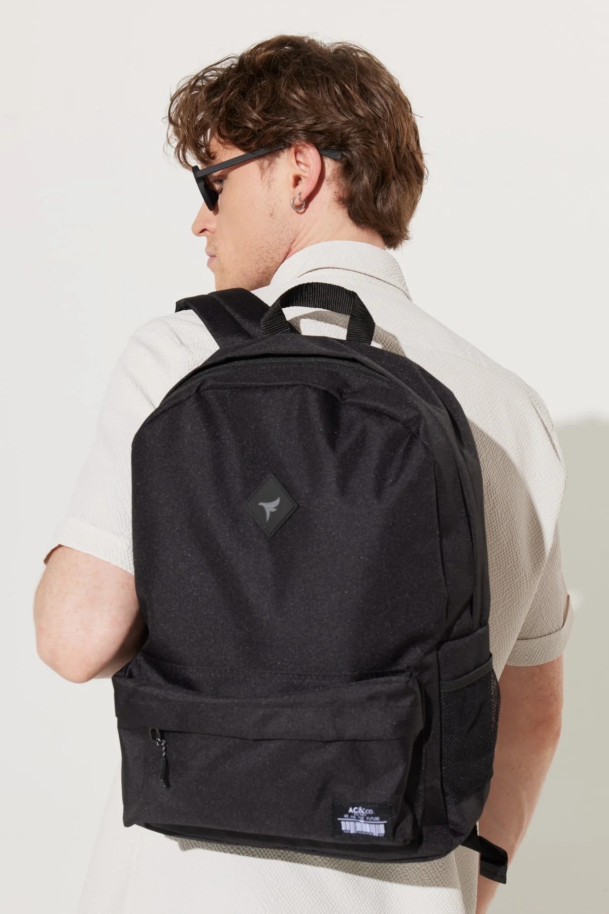 Black polyurethane casual school backpack with logo detail