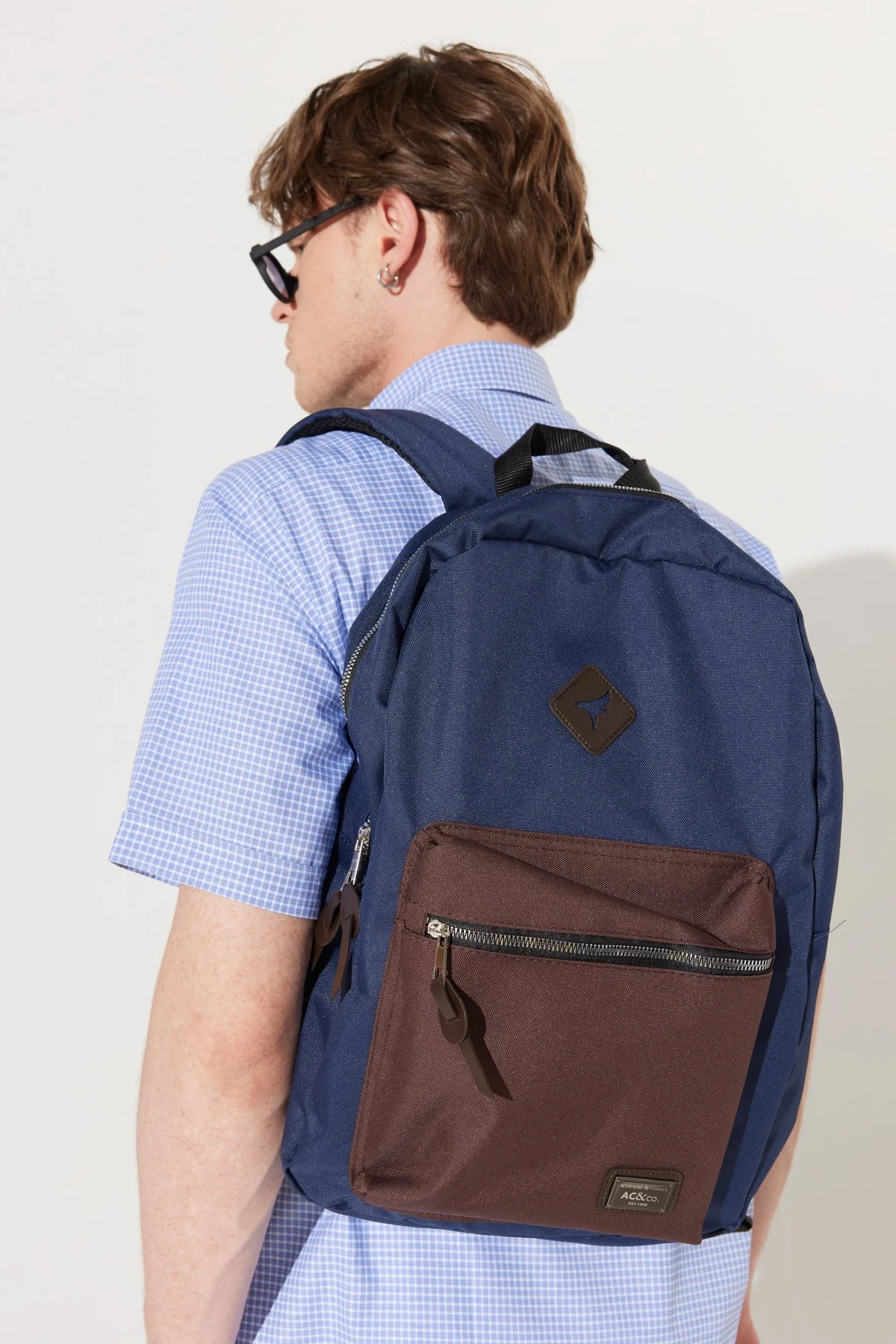 Navy blue and brown logo backpack 31 x 40 cm
