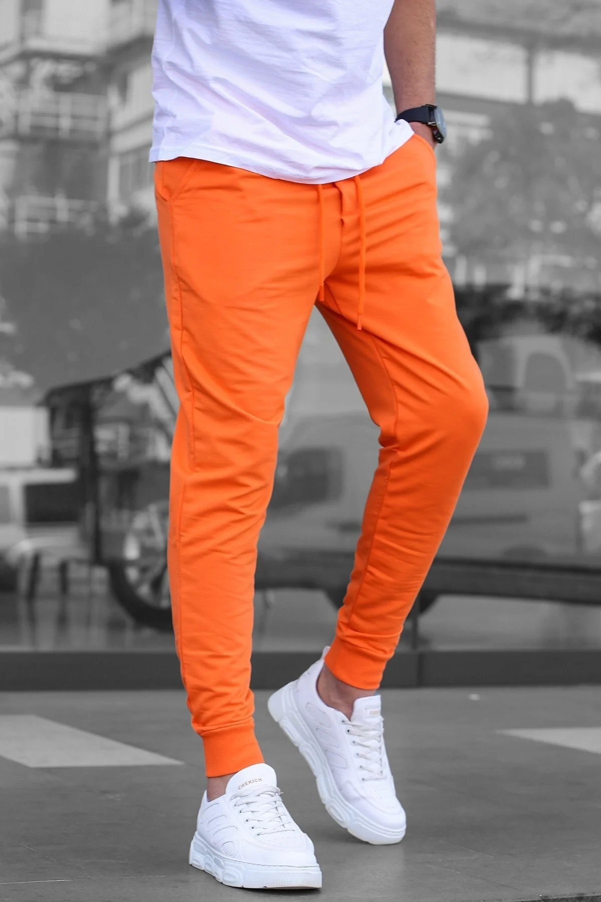 Men's relaxed-fit cotton blend tracksuit in orange with elasticated cuffs