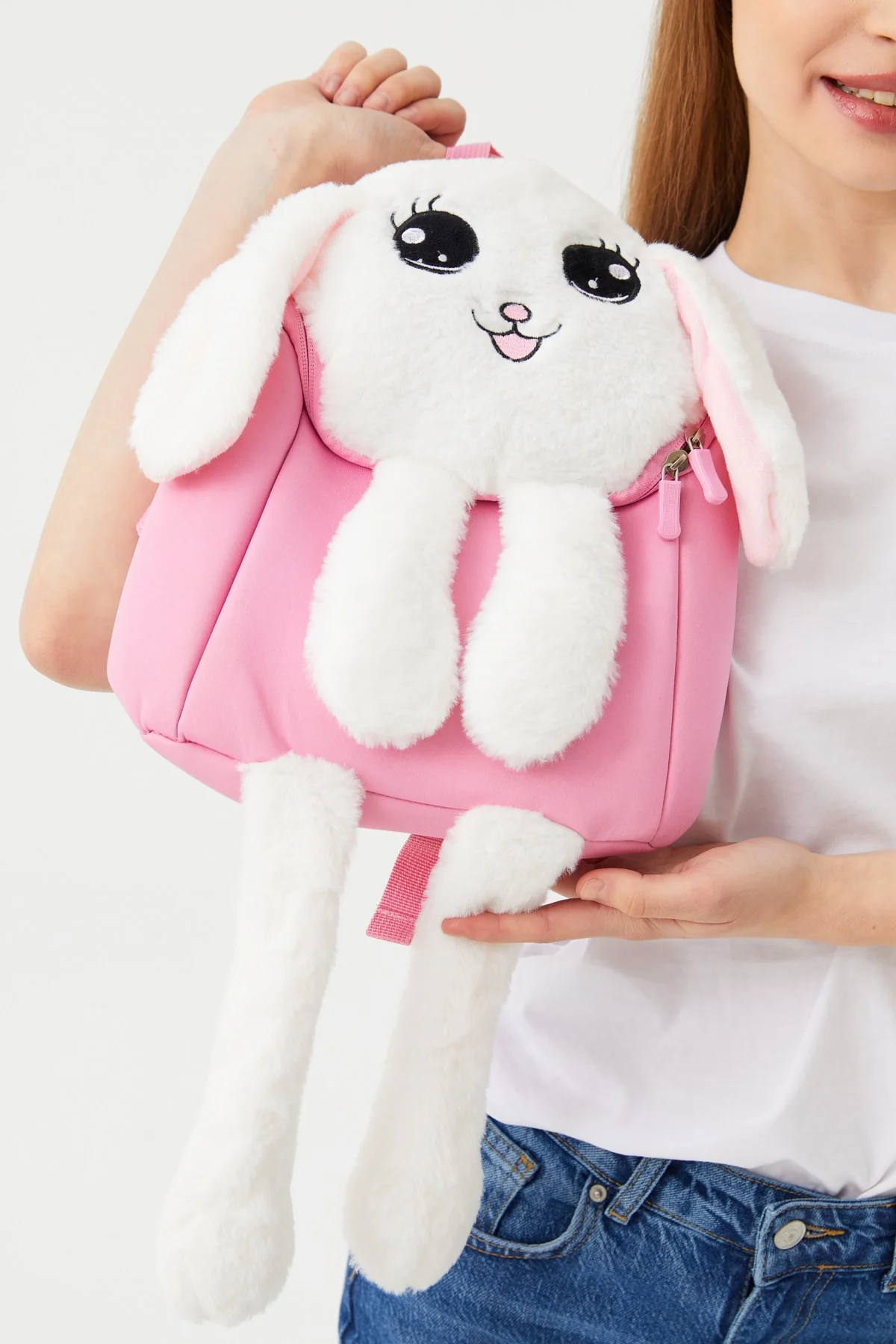 Interactive plush bunny backpack with playful ears for children