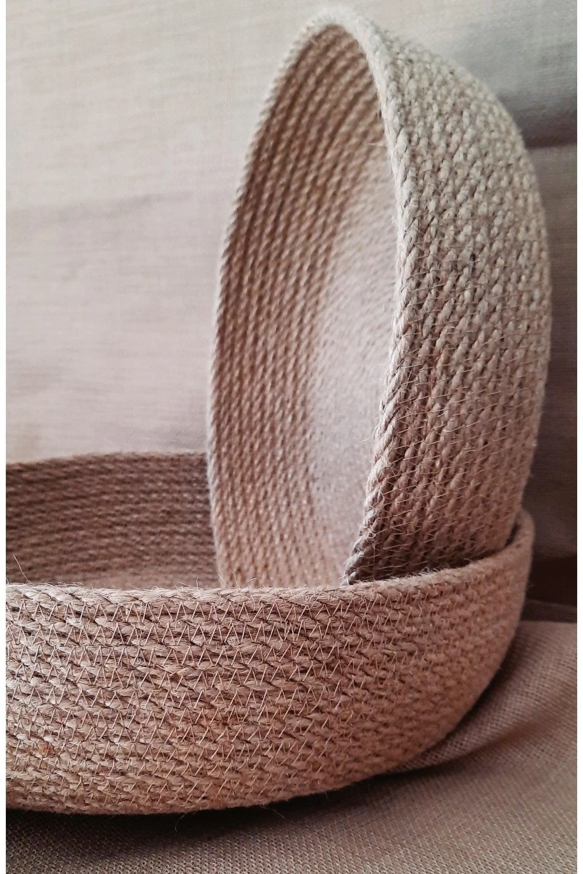 Set of two woven jute and wicker baskets with stylish handles
