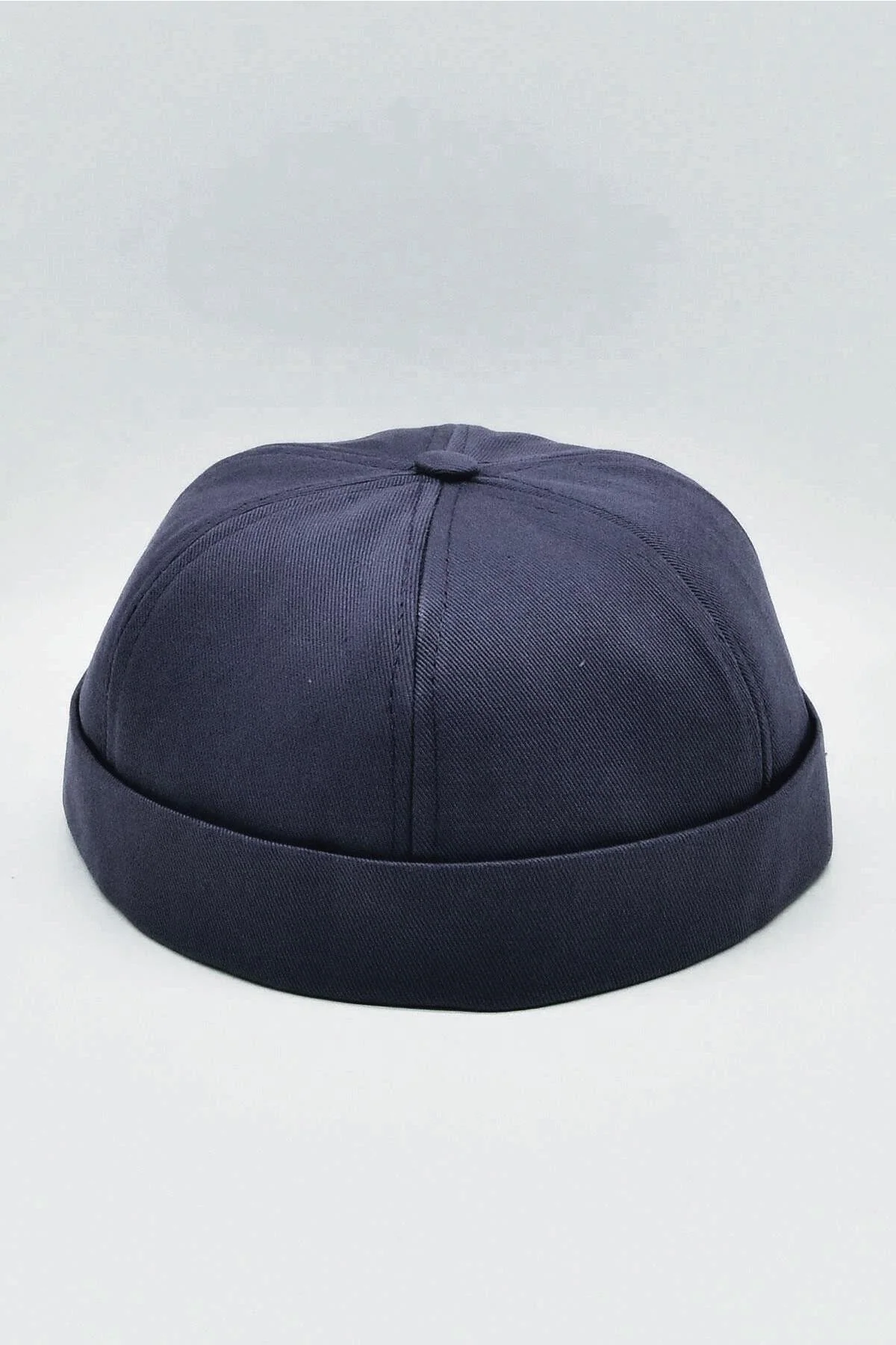 Navy blue cotton cap with adjustable fit