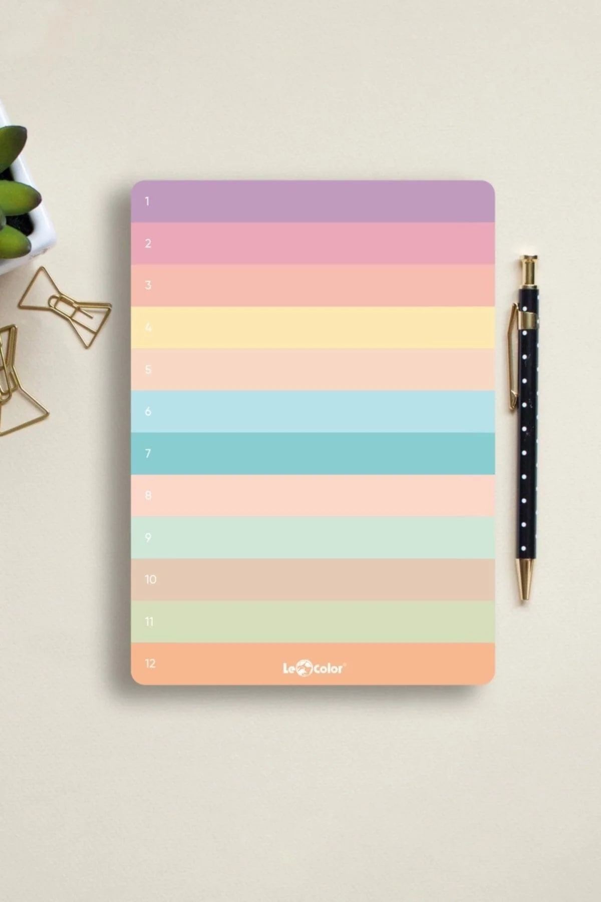Pastel numbered desk planner with removable pages