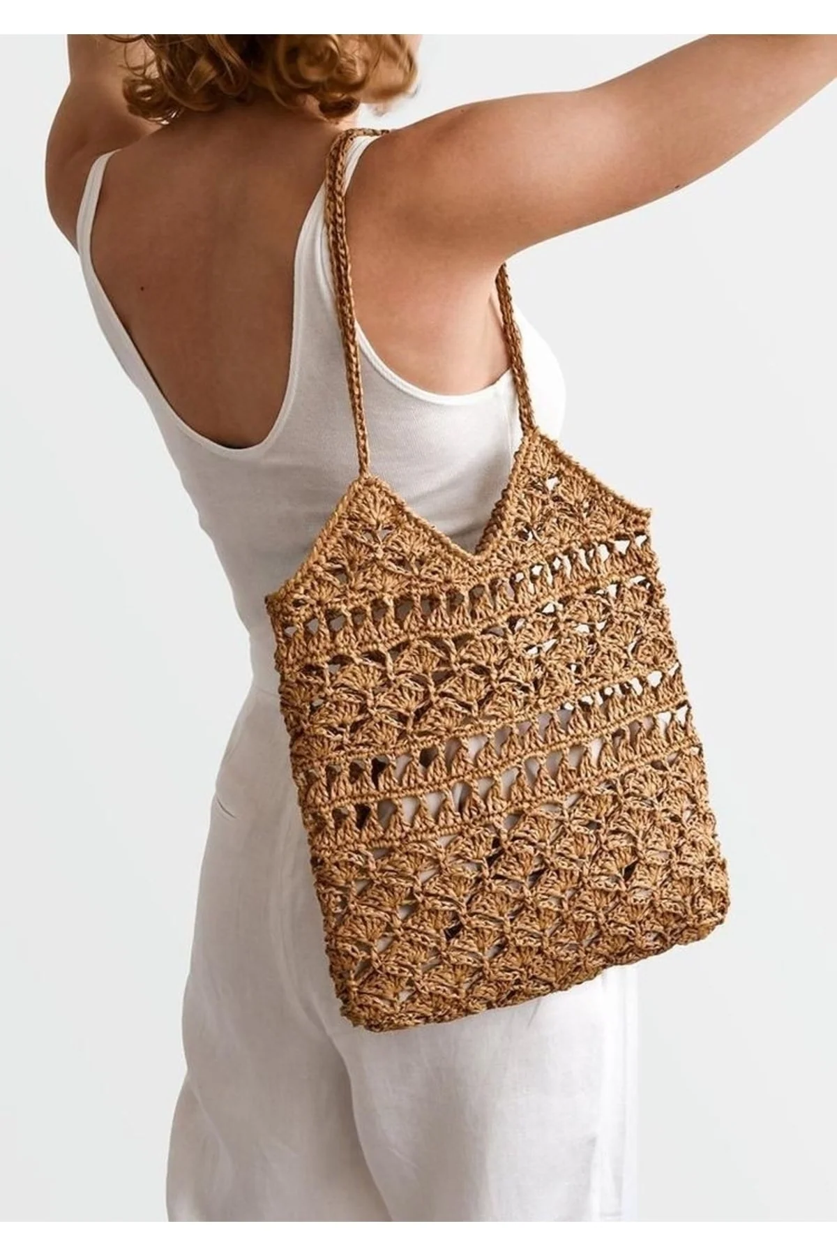 Natural straw tote bag with snap closure