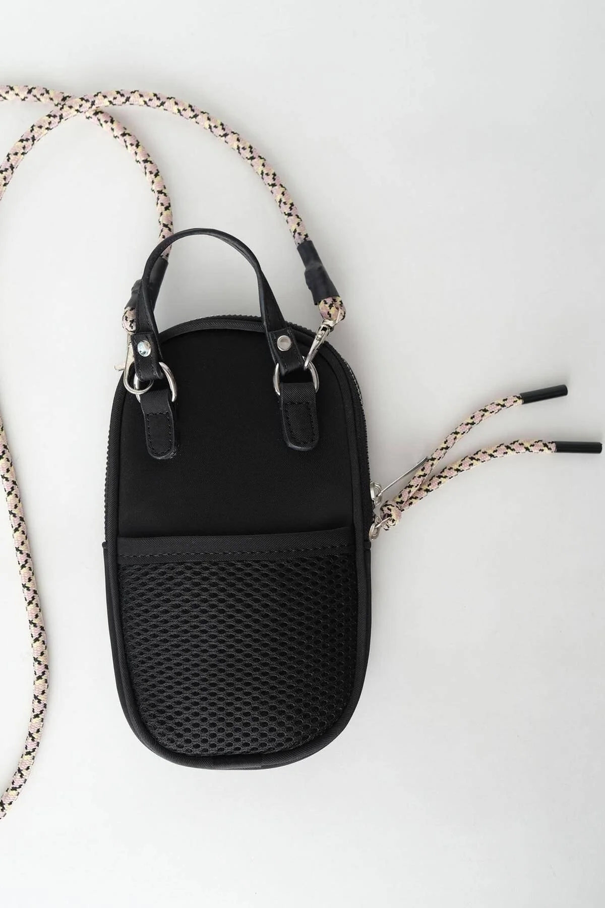 Black phone bag with zippered closure and detachable strap