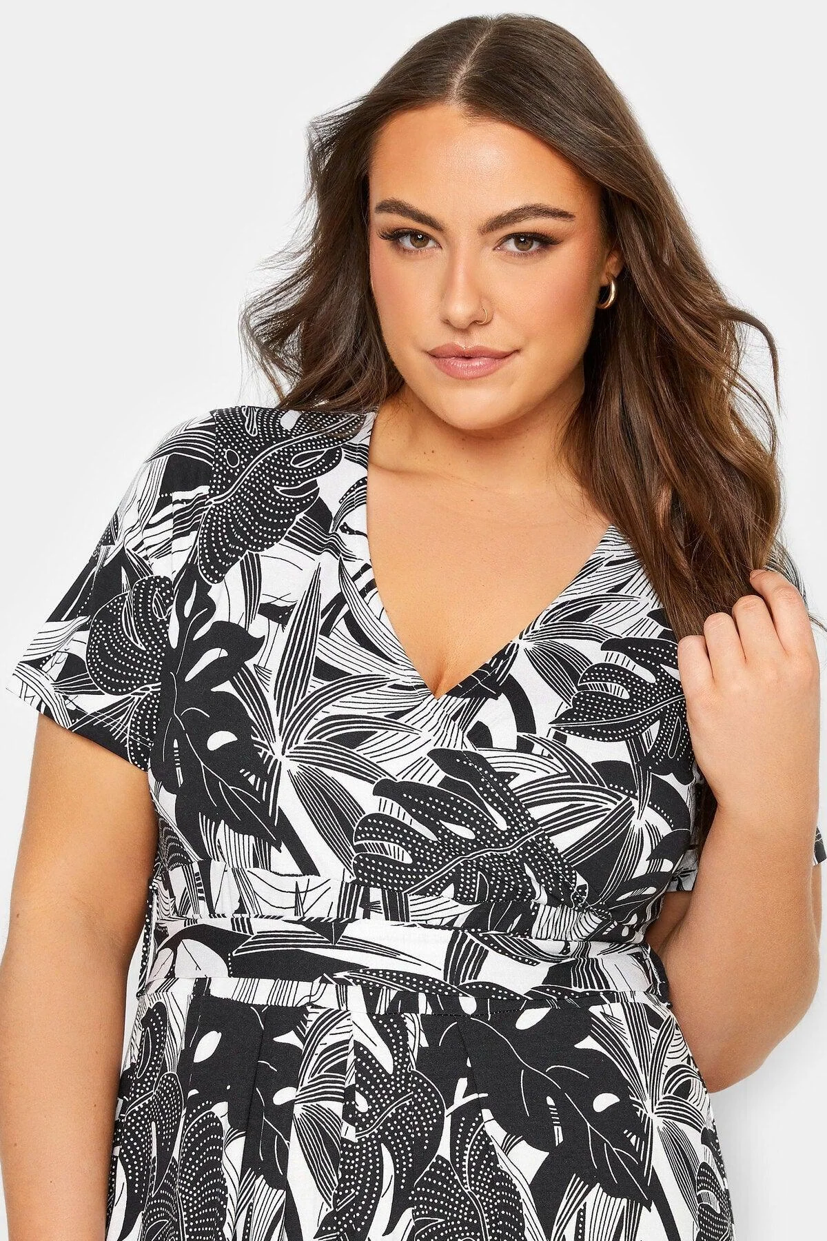 Plus size patterned long sleeve jersey dress with V-neck