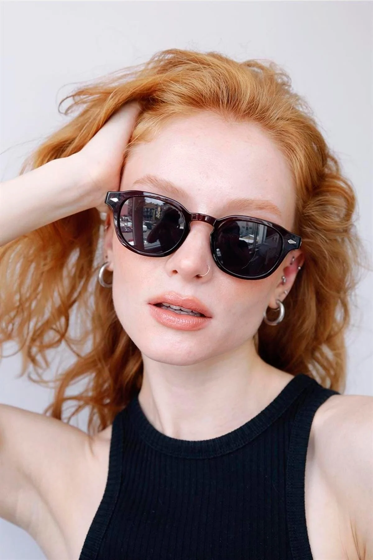 Impact-resistant red and black sunglasses with CR39 lenses