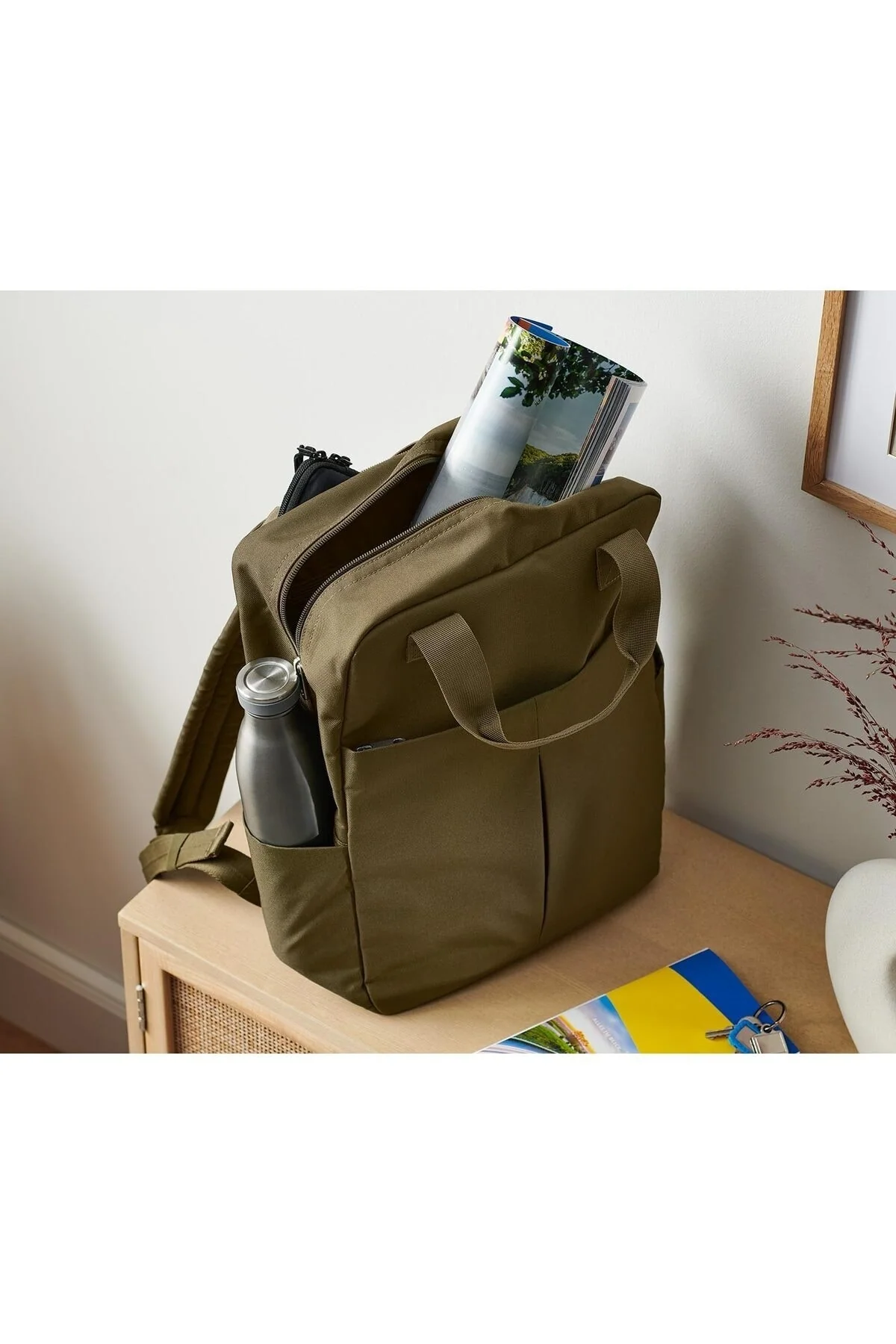 Olive green waterproof backpack with secure zipper