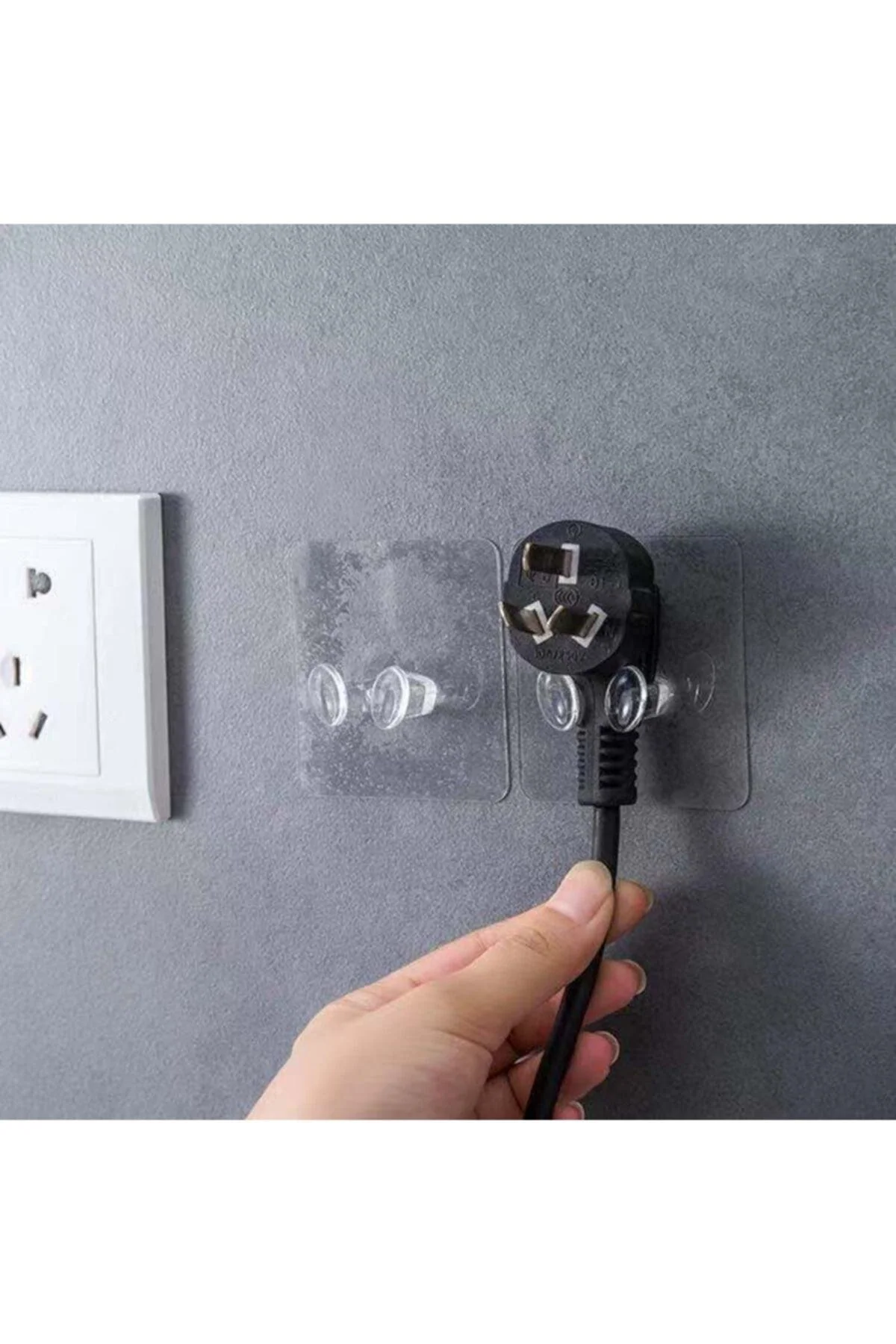 Self-adhesive cable hanger for organizing cords and utensils