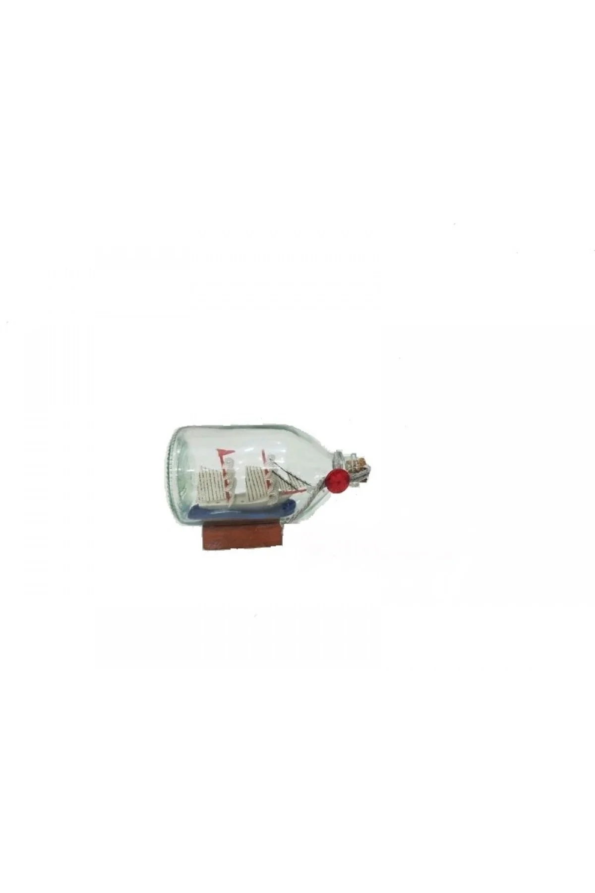 Miniature glass ship model in a bottle for office decor