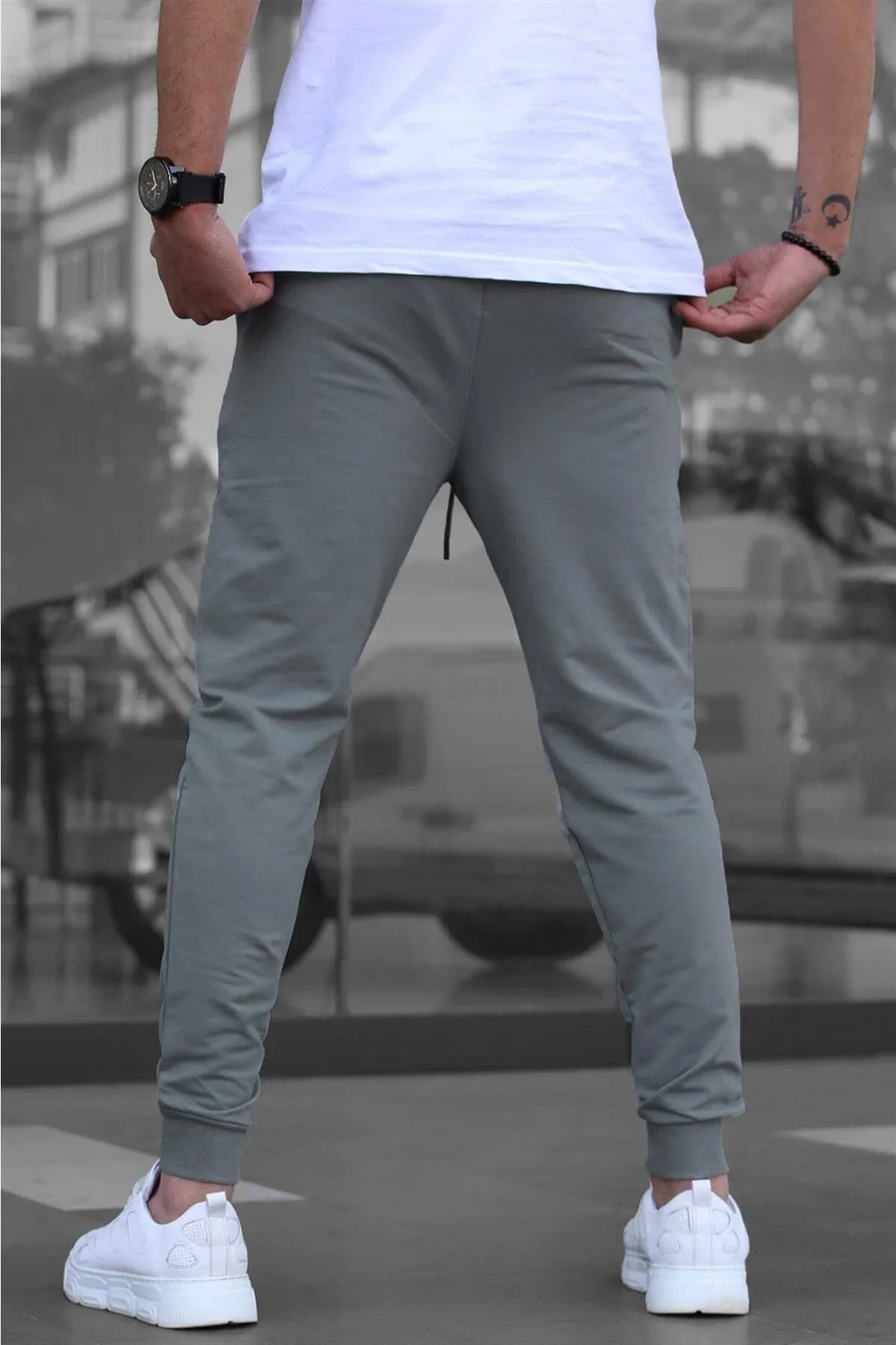 Men's smoked elasticated tracksuit pants with relaxed fit and side pockets