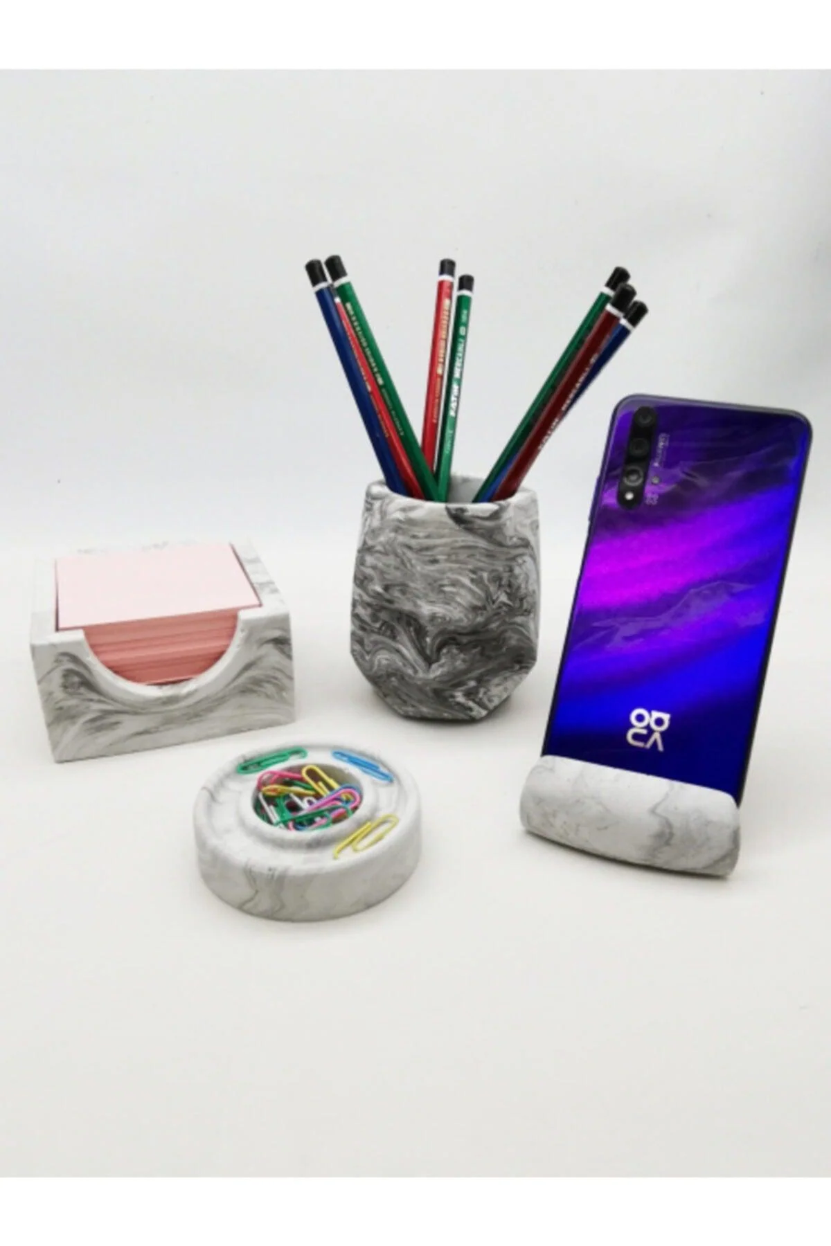 Concrete-look tabletop set with pen holder, notepad, and phone stand