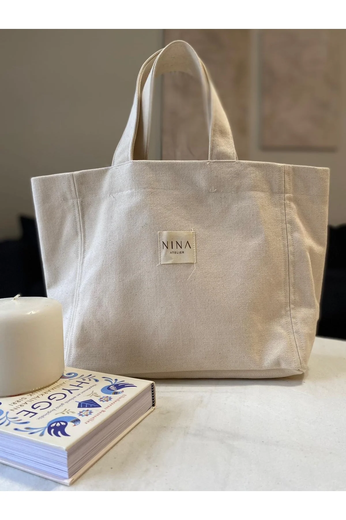 Small linen tote bag with sleeve handles for everyday essentials