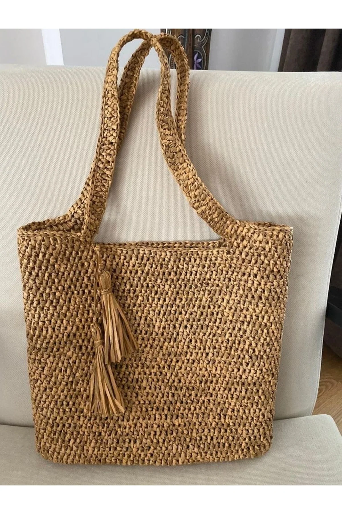 Natural straw tote bag with snap closure