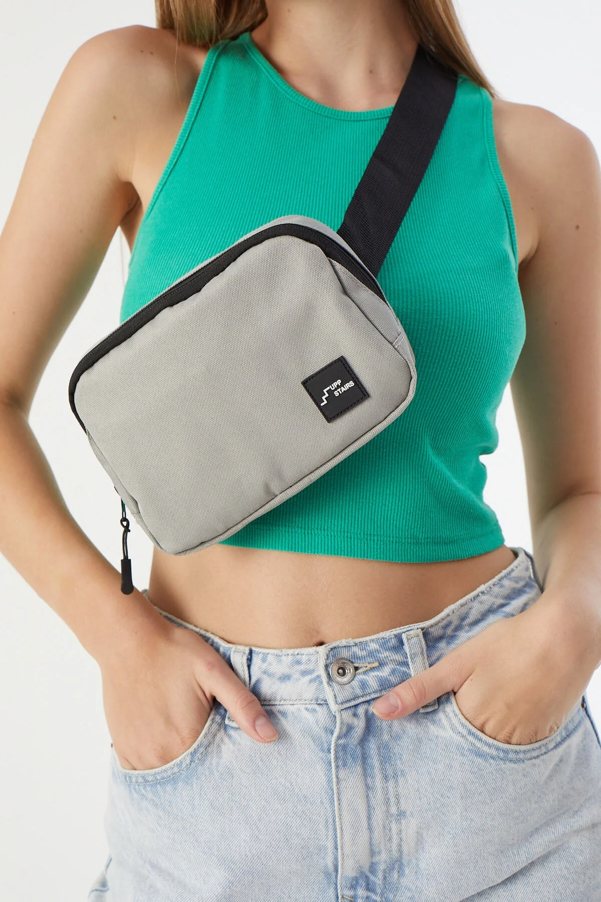 Unisex waist bag with mesh compartments and back pocket for security