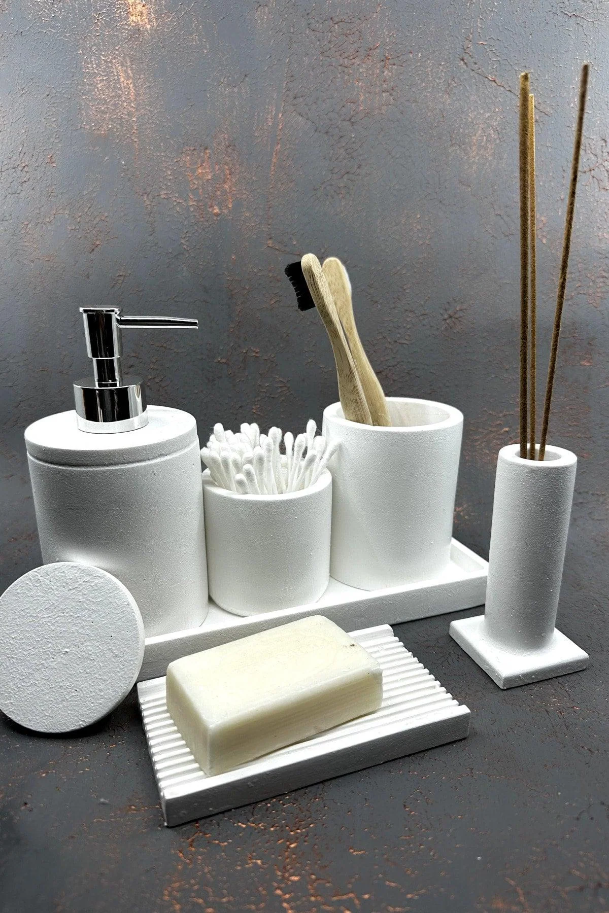 Elegant white concrete bathroom accessory set
